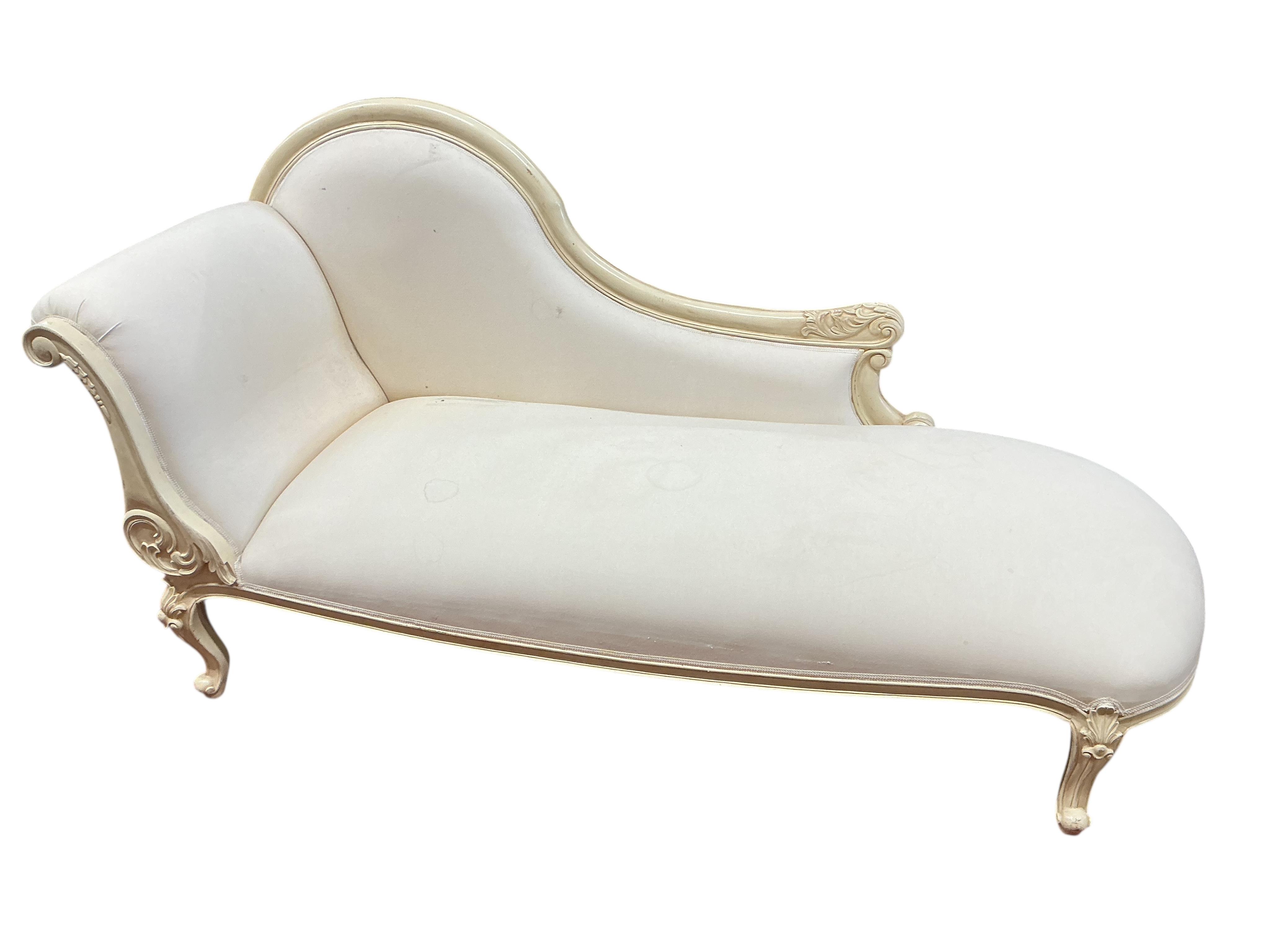 A modern cream painted chaise longue